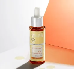 Eveline Cosmetics Serum Shot rozświetlające serum do twarzy szyi i dekoltu 15% witaminy C + CG 30 ml