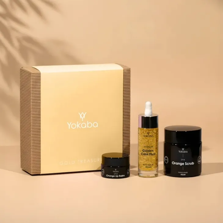 Yokaba Gold Treasure zestaw prezentowy do pielęgnacji olejek do twarzy i ciała 30 ml + cukrowy peeling do ciała 100 ml + balsam do ust 15 ml